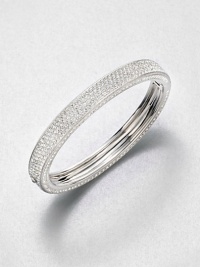 Shimmer on the top and shimmer on the edges adds up to dazzle that just goes on and on.CrystalRhodium platingDiameter, about 2.25Hinged with tongue-and-groove claspImported Shimmer on the top and shimmer on the edges adds up to dazzle that just goes on and on.CrystalRhodium platingDiameter, about 2.25Hinged with tongue-and-groove claspImported