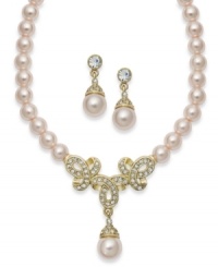 Inspire your look with something sophisticated. This Charter Club jewelry set combines pink simulated pearls with a multitude of round-cut crystals in pretty patterns. Setting crafted in gold tone mixed metal. Approximate length: 16 inches + 2-inch extender. Approximate drop (earring): 1-1/3 inches. Set comes packaged in a signature gift set.