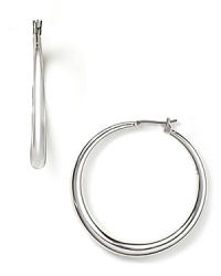 Graceful hoops earrings from Lauren Ralph Lauren, simply crafted from polished silver plate. Graceful hoops earrings from Lauren Ralph Lauren, simply crafted from polished silver plate.