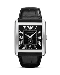 Heritage style informs this Emporio Armani watch, which flaunts a sleekly styled rectangular face, black matte dial, and croc-embossed leather strap. Heritage style informs this Emporio Armani watch, which flaunts a sleekly styled rectangular face, black matte dial, and croc-embossed leather strap.