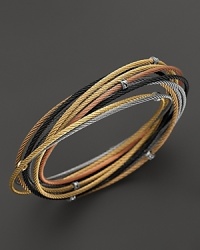 18K gold stations accent a mix of stainless steel cable bangles in black, grey, rose and yellow PVD. From Charriol. 18K gold stations accent a mix of stainless steel cable bangles in black, grey, rose and yellow PVD. From Charriol.