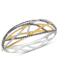 A woven web of sparkle and shine. Genevieve & Grace's chic crisscross bangle combines sterling silver and 18k gold over sterling silver with glittering marcasite accents. Approximate length: 7 inches. A woven web of sparkle and shine. Genevieve & Grace's chic crisscross bangle combines sterling silver and 18k gold over sterling silver with glittering marcasite accents. Approximate length: 7 inches.