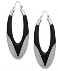 A thoroughly modern design. These oval hoop earrings from Bar III flaunt sleek black resin on a captivating silhouette. Crafted in silver tone mixed metal. Approximate drop: 2-1/2 inches. A thoroughly modern design. These oval hoop earrings from Bar III flaunt sleek black resin on a captivating silhouette. Crafted in silver tone mixed metal. Approximate drop: 2-1/2 inches.