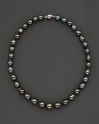 Darkly shimmering Tahitian pearls with 14K. white gold. Darkly shimmering Tahitian pearls with 14K. white gold.