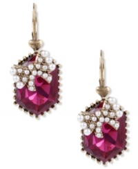A pretty little package from Betsey Johnson. Drop earrings grab attention with fuchsia-colored crystal accents topped with glass pearl bow accents. A truly cute look for any outfit. Crafted in antiqued gold tone mixed metal. Approximate drop: 1-1/3 inches. A pretty little package from Betsey Johnson. Drop earrings grab attention with fuchsia-colored crystal accents topped with glass pearl bow accents. A truly cute look for any outfit. Crafted in antiqued gold tone mixed metal. Approximate drop: 1-1/3 inches.