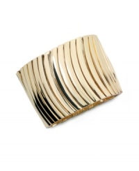 Catch the next wave of great style with Alfani's wavy stretch bracelet. Wear it to work or on weekends for a unique, eye-catching look. Crafted in gold tone mixed metal. Bracelet stretches to fit wrist. Approximate diameter: 7-1/2 inches. Catch the next wave of great style with Alfani's wavy stretch bracelet. Wear it to work or on weekends for a unique, eye-catching look. Crafted in gold tone mixed metal. Bracelet stretches to fit wrist. Approximate diameter: 7-1/2 inches.