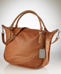 Exuding rich heritage character, the Marlborough leather tote from Lauren by Ralph Lauren is rendered in buttery leather with silver-tone equestrian-inspired hardware for a polished, modern look. Exuding rich heritage character, the Marlborough leather tote from Lauren by Ralph Lauren is rendered in buttery leather with silver-tone equestrian-inspired hardware for a polished, modern look.