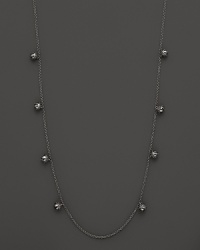 Inspired by Zen philosophy, this intricately detailed sterling silver necklace from Paul Morelli softly jingles with eight meditation bells. Inspired by Zen philosophy, this intricately detailed sterling silver necklace from Paul Morelli softly jingles with eight meditation bells.