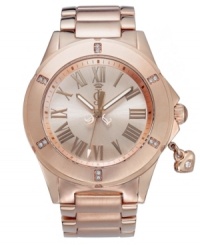 Flaunt your wealth of fashion knowledge with this rosy Rich Girl watch by Juicy Couture.