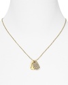 Let Michael Kors pavé dog tags brand an all-American look. This logo engraved design slips over basics and adds a touch of polish.