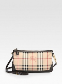 Signature check highlights this zip-top PVC bag, finished with rich leather trim.Removable adjustable shoulder strap, 20¾-24 dropTop zip closureNylon lining10W X 5¾H X 1½DImported Signature check highlights this zip-top PVC bag, finished with rich leather trim.Removable adjustable shoulder strap, 20¾-24 dropTop zip closureNylon lining10W X 5¾H X 1½DImported