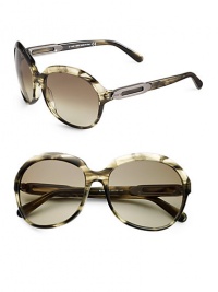 THE LOOKOversized round styleAcetate framesMetal accented templesUVA and UVB protectionSignature case includedORIGINMade in Italy THE LOOKOversized round styleAcetate framesMetal accented templesUVA and UVB protectionSignature case includedORIGINMade in Italy