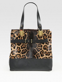 A strong exotic print and polished hardware define this chic carryall, mixing ultra-smooth leather with soft pony hair. Double leather top handles, 8¾ dropOne inner zip pouchReverses to brown leather12W X 12H X 6DMade in Italy A strong exotic print and polished hardware define this chic carryall, mixing ultra-smooth leather with soft pony hair. Double leather top handles, 8¾ dropOne inner zip pouchReverses to brown leather12W X 12H X 6DMade in Italy
