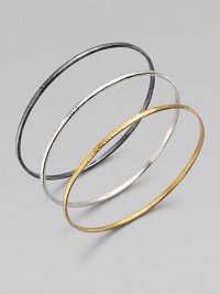 From the Skittle Collection. Three wispy hammered bangles - blackened and white sterling silver and 24k yellow gold - are minimalist in design with impactful results.24k yellow gold Sterling silver Imported From the Skittle Collection. Three wispy hammered bangles - blackened and white sterling silver and 24k yellow gold - are minimalist in design with impactful results.24k yellow gold Sterling silver Imported