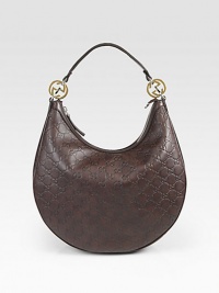 Rounded shape of Guccissima leather with signature GG accents. Single top handle, 7 dropTop zip closureOne inside zip pocketTwo inside open pockets Fully lined13W X 9½H X 4¾DMade in Italy Rounded shape of Guccissima leather with signature GG accents. Single top handle, 7 dropTop zip closureOne inside zip pocketTwo inside open pockets Fully lined13W X 9½H X 4¾DMade in Italy