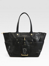 A chic and roomy style in luxurious leather, perfectly sized for all your essentials.Double shoulder straps, 9 dropTop zip closureDetachable luggage tagThree outside open pocketsOne inside zip pocketTwo inside open pocketsFully lined12¾W X 10H X 6DImported A chic and roomy style in luxurious leather, perfectly sized for all your essentials.Double shoulder straps, 9 dropTop zip closureDetachable luggage tagThree outside open pocketsOne inside zip pocketTwo inside open pocketsFully lined12¾W X 10H X 6DImported