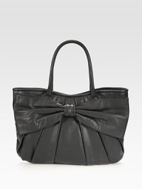 Italian calfskin leather in a classic top-handle silhouette, topped off with a center bow and elegant pleating. Double top handles, 7½ dropMagnetic snap closureOne inside zip pocketTwo inside open pocketsCotton lining16½W X 10¼H X 2¾DMade in Italy Italian calfskin leather in a classic top-handle silhouette, topped off with a center bow and elegant pleating. Double top handles, 7½ dropMagnetic snap closureOne inside zip pocketTwo inside open pocketsCotton lining16½W X 10¼H X 2¾DMade in Italy