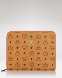Work heritage-inspired style with this iPad case from MCM. Crafted from coated canvas and splashed with the brand's signature motif, it instantly upgrades your technology. Work heritage-inspired style with this iPad case from MCM. Crafted from coated canvas and splashed with the brand's signature motif, it instantly upgrades your technology.
