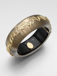From the Lucite Modulor Collection. This striking wide bangle of hand-sculpted, hand-painted Lucite is adorned with a free-form chain motif, dotted with shimmering Swarovski crystals.CrystalLuciteGoldtoneDiameter, about 2.4Width, about .9Hinged, with magnetic closureMade in USA From the Lucite Modulor Collection. This striking wide bangle of hand-sculpted, hand-painted Lucite is adorned with a free-form chain motif, dotted with shimmering Swarovski crystals.CrystalLuciteGoldtoneDiameter, about 2.4Width, about .9Hinged, with magnetic closureMade in USA