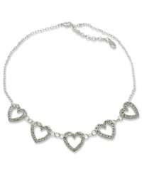 Let your heart shine with this GUESS collar necklace flaunting five heart pendants embellished with crystal accents. Crafted in silver tone mixed metal. Approximate length: 16 inches + 2-inch extender. Let your heart shine with this GUESS collar necklace flaunting five heart pendants embellished with crystal accents. Crafted in silver tone mixed metal. Approximate length: 16 inches + 2-inch extender.