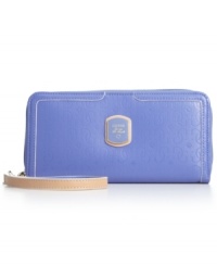 Graphic 4-G pattern and signature golden hardware lend a luxe look to this sleek wallet from GUESS. Its precisely organized interior includes plenty of compartments to keep your stash safe and secure. Graphic 4-G pattern and signature golden hardware lend a luxe look to this sleek wallet from GUESS. Its precisely organized interior includes plenty of compartments to keep your stash safe and secure.