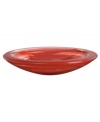 Punctuate modern decor with the eye-catching Atoll dish from Kosta Boda. Layers of red swirl and wrap luxe art glass in dreamy, understated grace. In a soft round shape to emphasize the free-form design. Designed by Anna Ehrner.