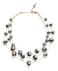 Eye-catching shimmer to spice up any office or weekend look. This Kenneth Cole New York necklace crafted from mixed metal features three strands of intricately faceted silver beads. Approximate Length: 16 inches with 2-inch extender. Eye-catching shimmer to spice up any office or weekend look. This Kenneth Cole New York necklace crafted from mixed metal features three strands of intricately faceted silver beads. Approximate Length: 16 inches with 2-inch extender.