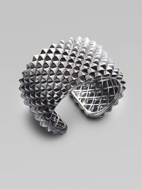 A dramatic cuff design, with a stud-like texture and a stunning finish of black rhodium over sterling silver. Black rhodium-finished sterling silver Diameter, about 2½ Width, about 1¾ Hinged Imported A dramatic cuff design, with a stud-like texture and a stunning finish of black rhodium over sterling silver. Black rhodium-finished sterling silver Diameter, about 2½ Width, about 1¾ Hinged Imported