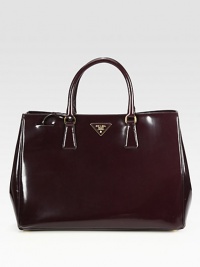 Polished leather adds elegance to this structured style.Double top handles, 5 dropMagnetic side snap gussetMagnetic snap closureProtective metal feetOne inside zip pocketThree inside open pocketsSignature jacquard lining14¾W X 10¼H X 6¾DMade in Italy Polished leather adds elegance to this structured style.Double top handles, 5 dropMagnetic side snap gussetMagnetic snap closureProtective metal feetOne inside zip pocketThree inside open pocketsSignature jacquard lining14¾W X 10¼H X 6¾DMade in Italy