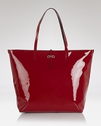 Polish up your practical portfolio with this top zip tote from Salvatore Ferragamo. Crafted from glossy patent leather and spaciously sized, it's a luxurious take on the day bag. Polish up your practical portfolio with this top zip tote from Salvatore Ferragamo. Crafted from glossy patent leather and spaciously sized, it's a luxurious take on the day bag.