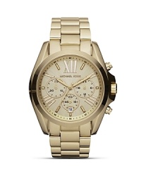 Adapt a sleek approach to accessorizing with this gold-plated watch from Michael Kors. The oversized bezel makes this piece stand out, so wear it to set off day-to-day looks. Adapt a sleek approach to accessorizing with this gold-plated watch from Michael Kors. The oversized bezel makes this piece stand out, so wear it to set off day-to-day looks.