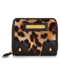 A petite version of its ultra-glam big sister, this mini Juicy Couture wallet showcases the same posh velour leopard print, soft leather trim and shiny golden hardware. Plenty of interior pockets easily hold cards, cash, coins and ID, and it discretely slips into any purse without a worry. A petite version of its ultra-glam big sister, this mini Juicy Couture wallet showcases the same posh velour leopard print, soft leather trim and shiny golden hardware. Plenty of interior pockets easily hold cards, cash, coins and ID, and it discretely slips into any purse without a worry.
