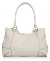 Completely covet-worthy, this sleek satchel from Calvin Klein is a contemporary classic. Clean lines, soft Saffiano leather and signature detailing lend an understated, elegant attitude that works from desk-to-dinner. Completely covet-worthy, this sleek satchel from Calvin Klein is a contemporary classic. Clean lines, soft Saffiano leather and signature detailing lend an understated, elegant attitude that works from desk-to-dinner.