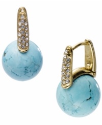 Take the world by storm. Michael Kors' globe-inspired earrings feature reconstituted turquoise beads and sparkling glass accents. Set in gold tone mixed metal with a steel huggie backing. Approximate drop length: 3/4 inch. Approximate drop width: 1/2 inch.