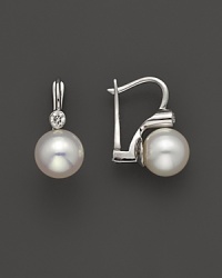 Diamonds and pearls in elegant, timeless 14K. white gold settings. Diamonds and pearls in elegant, timeless 14K. white gold settings.