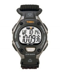 Strap it on and hit the ground running with this digital Ironman watch by Timex. Black Velcro® strap and round gray resin case. Orange logo at bezel. Positive display digital dial features initial time, day, date, seconds and 30-lap memory recall. Quartz movement. Water resistant to 100 meters. One-year limited warranty. Strap it on and hit the ground running with this digital Ironman watch by Timex. Black Velcro® strap and round gray resin case. Orange logo at bezel. Positive display digital dial features initial time, day, date, seconds and 30-lap memory recall. Quartz movement. Water resistant to 100 meters. One-year limited warranty.