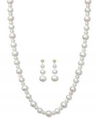 Add ultimate sophistication to your look. This stunning jewelry set features a matching pearl strand necklace and drop earrings with large and small cultured freshwater pearls (4-10 mm). Set in 14k gold. Approximate length: 18 inches. Approximate drop: 1-1/2 inches. Add ultimate sophistication to your look. This stunning jewelry set features a matching pearl strand necklace and drop earrings with large and small cultured freshwater pearls (4-10 mm). Set in 14k gold. Approximate length: 18 inches. Approximate drop: 1-1/2 inches.