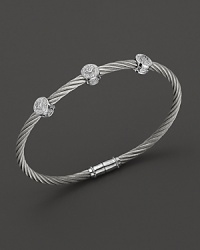 From the Classique Collection, a stackable bangle in white gold and stainless steel with diamond stations. Designed by Charriol. From the Classique Collection, a stackable bangle in white gold and stainless steel with diamond stations. Designed by Charriol.