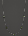Bezel set diamonds and peridot stones in a sterling silver chaing from Ippolita.