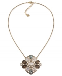 Clustered cool. Carolee's necklace, crafted from gold-tone mixed metal, stuns with a pendant bringing together glass pearls, cubic zirconias and epoxy stones to beautiful effect. Approximate length: 17 inches. Approximate drop: 2-1/4 inches. Clustered cool. Carolee's necklace, crafted from gold-tone mixed metal, stuns with a pendant bringing together glass pearls, cubic zirconias and epoxy stones to beautiful effect. Approximate length: 17 inches. Approximate drop: 2-1/4 inches.
