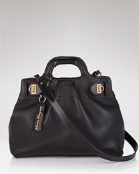 Iconic style is simple with Salvatore Ferragamo's perfectly shaped satchel in soft, luxe leather. Iconic style is simple with Salvatore Ferragamo's perfectly shaped satchel in soft, luxe leather.