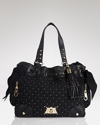Juicy Couture knows what dreams are made of: a fun and flirty day time bag, sweetened up in quilted nylon. Its snap closure opens to an interior with 3 pockets. Juicy Couture knows what dreams are made of: a fun and flirty day time bag, sweetened up in quilted nylon. Its snap closure opens to an interior with 3 pockets.