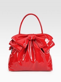 Lustrous patent leather in a roomy carryall, topped with a chic oversized bow.Double top handles, 5¼ dropRemovable shoulder strap, 15 dropTop zip closureProtective metal feetOne inside zip pocketTwo inside open pocketsCotton lining12¾W X 9½H X 4½DMade in Italy Lustrous patent leather in a roomy carryall, topped with a chic oversized bow.Double top handles, 5¼ dropRemovable shoulder strap, 15 dropTop zip closureProtective metal feetOne inside zip pocketTwo inside open pocketsCotton lining12¾W X 9½H X 4½DMade in Italy