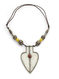 THE LOOKTribal arrow pendantTextured beadsAdjustable cord settingSilverplated THE MEASUREMENTPendant width, about 3Pendant length, about 5Length, about 21ORIGINMade in USA THE LOOKTribal arrow pendantTextured beadsAdjustable cord settingSilverplated THE MEASUREMENTPendant width, about 3Pendant length, about 5Length, about 21ORIGINMade in USA