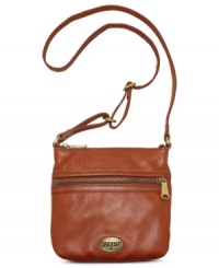 Before you head off on your next adventure, be sure to bring along this go-anywhere crossbody from Fossil. Buttery-soft leather juxtaposes with oversized zipper pulls for a look that's utilitarian-inspired yet still laid-back. Before you head off on your next adventure, be sure to bring along this go-anywhere crossbody from Fossil. Buttery-soft leather juxtaposes with oversized zipper pulls for a look that's utilitarian-inspired yet still laid-back.