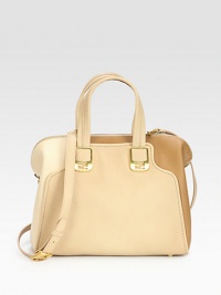 Supple leather in a beautiful, tonal colorblock design with radiant, signature hardware.Double top handles, 5 dropDetachable shoulder strap, 17-24 dropTop zip closureProtective metal feetThree inner compartmentsTwo inside open pocketsLinen lining12W X 9½H X 6DMade in Italy Supple leather in a beautiful, tonal colorblock design with radiant, signature hardware.Double top handles, 5 dropDetachable shoulder strap, 17-24 dropTop zip closureProtective metal feetThree inner compartmentsTwo inside open pocketsLinen lining12W X 9½H X 6DMade in Italy