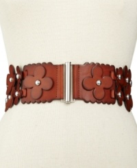 Flower power never looked so chic: this Steve Madden leather belt features a stretch body with floral detail. Pair with a flowing skirt to tighten up your seasonal style. Flower power never looked so chic: this Steve Madden leather belt features a stretch body with floral detail. Pair with a flowing skirt to tighten up your seasonal style.