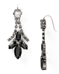 Silver gets a serious rock-chic edge in this pair of Juicy Couture earrings, accented by a drop of clustered hematite and jet stones. Silver gets a serious rock-chic edge in this pair of Juicy Couture earrings, accented by a drop of clustered hematite and jet stones.