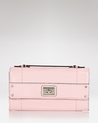 When the basic wallet won't do, this patent style from Milly steps in with polish. Its surprisingly spacious interior features multiple pockets, while a top handle is ideal for taking with you out on the town. When the basic wallet won't do, this patent style from Milly steps in with polish. Its surprisingly spacious interior features multiple pockets, while a top handle is ideal for taking with you out on the town.