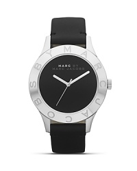 Perfect playful accessorizing with this watch from MARC BY MARC JACOBS. With a leather band and logo-engraved bezel, this piece has style-setter written all over it. Perfect playful accessorizing with this watch from MARC BY MARC JACOBS. With a leather band and logo-engraved bezel, this piece has style-setter written all over it.